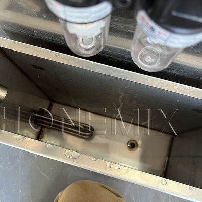 Máquina de enchimento de bálsamo aquecido para cosméticos Máquina de enchimento vertical semiautomática