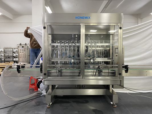 Máquina de preenchimento de creme Dez bocas de preenchimento de linha de rotulagem de tampa